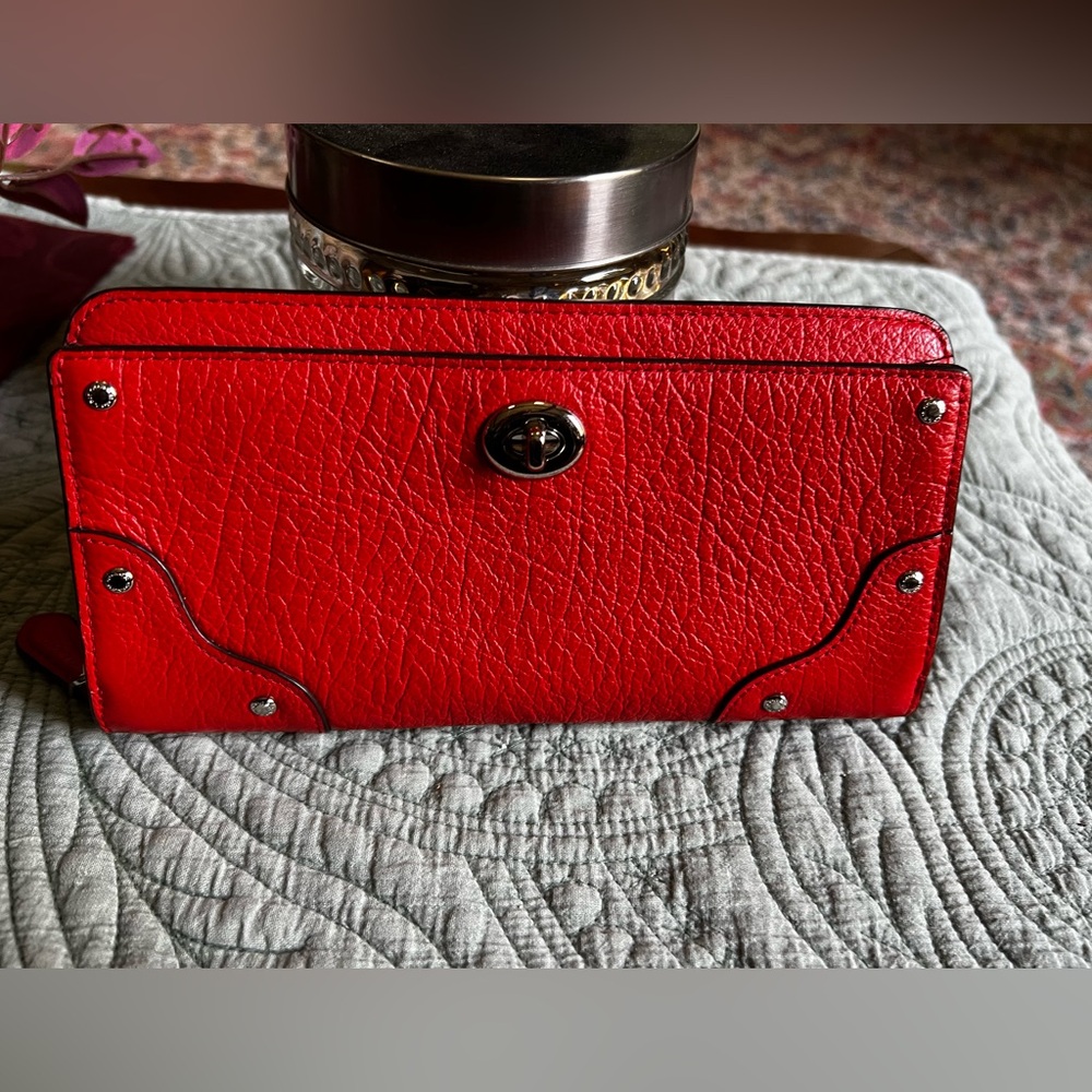 Coach dark orange pebble leather wallet